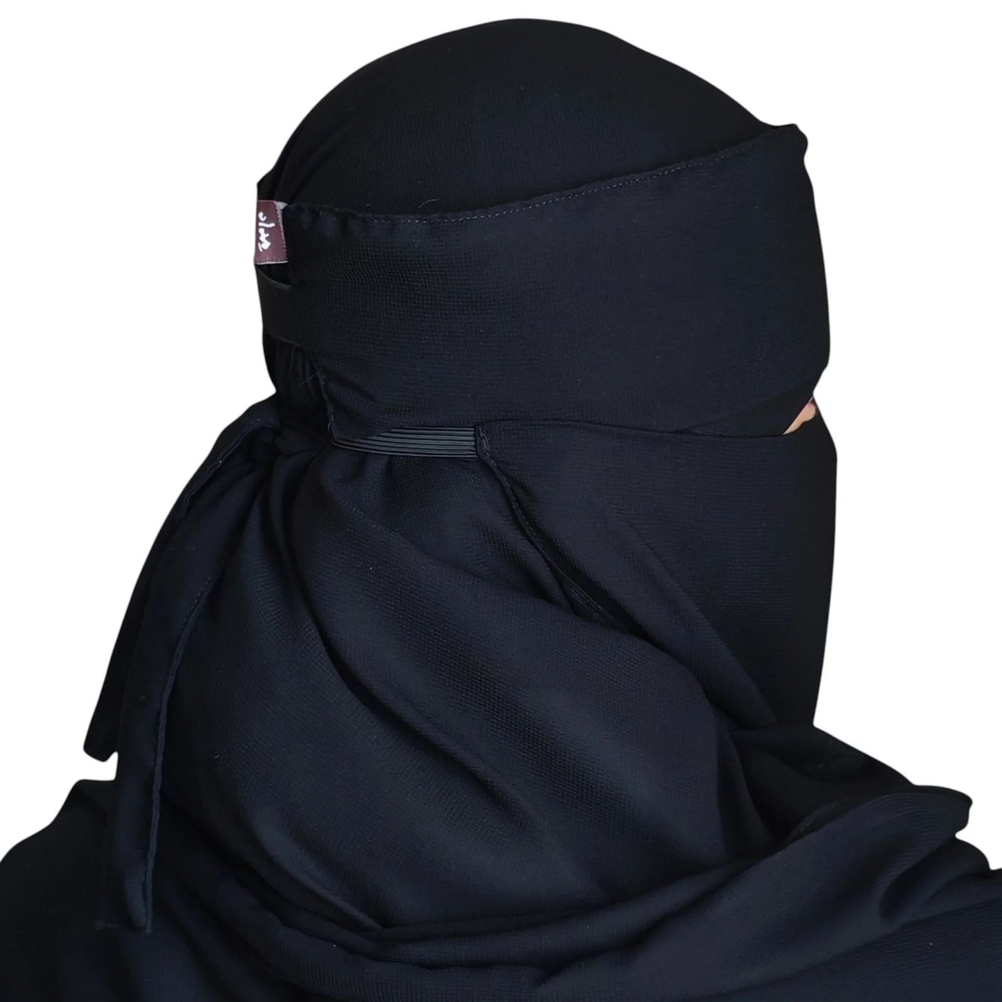 Niqab, voile et élastique